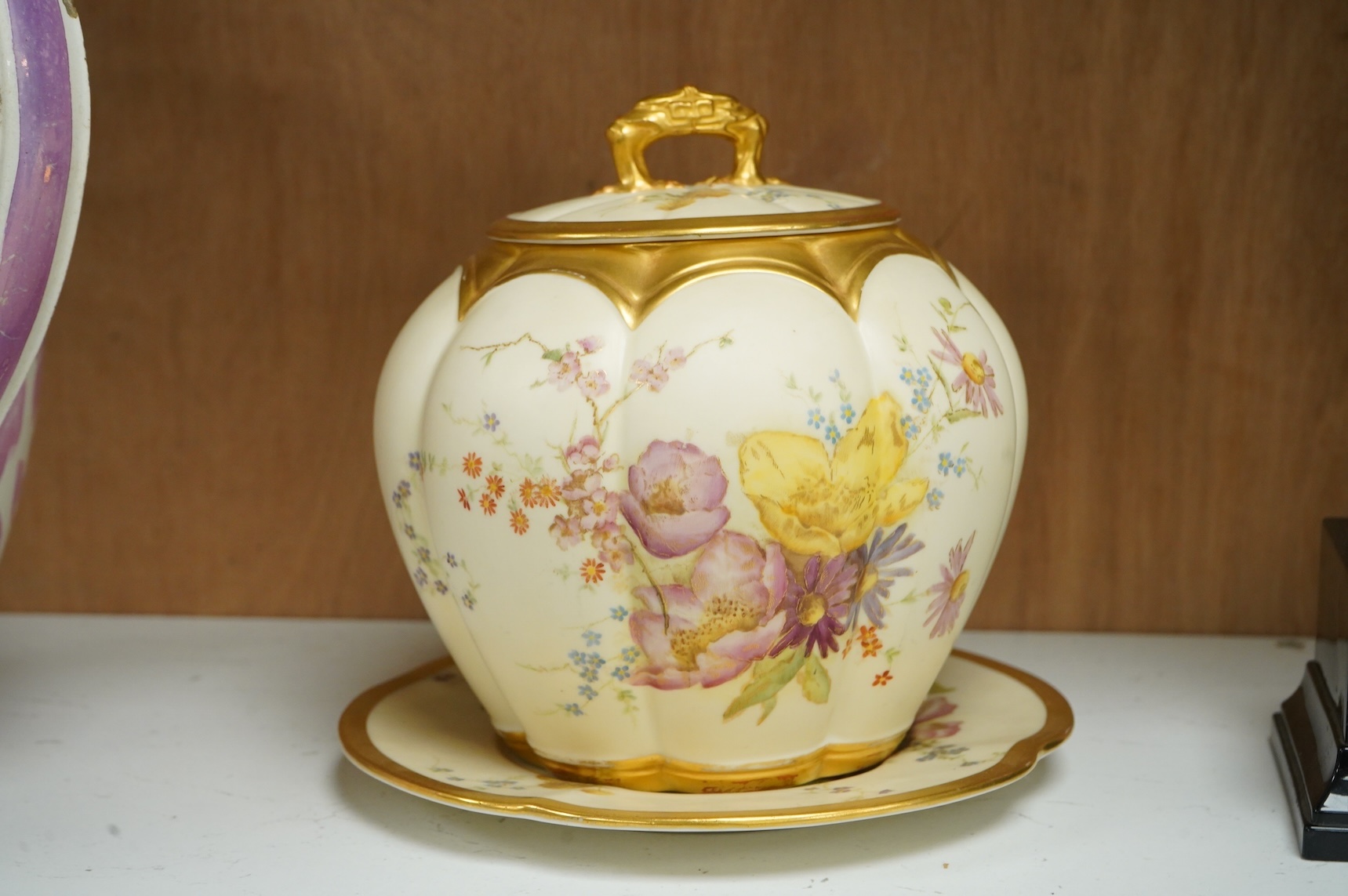 A Worcester floral biscuit barrel on stand, numbered 1412 to the base, 18cm high